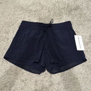 Athleta Baja shorts. Navy. Size 4. New with tags!